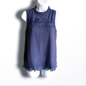 Mock neck sleeveless blue pleated blouse